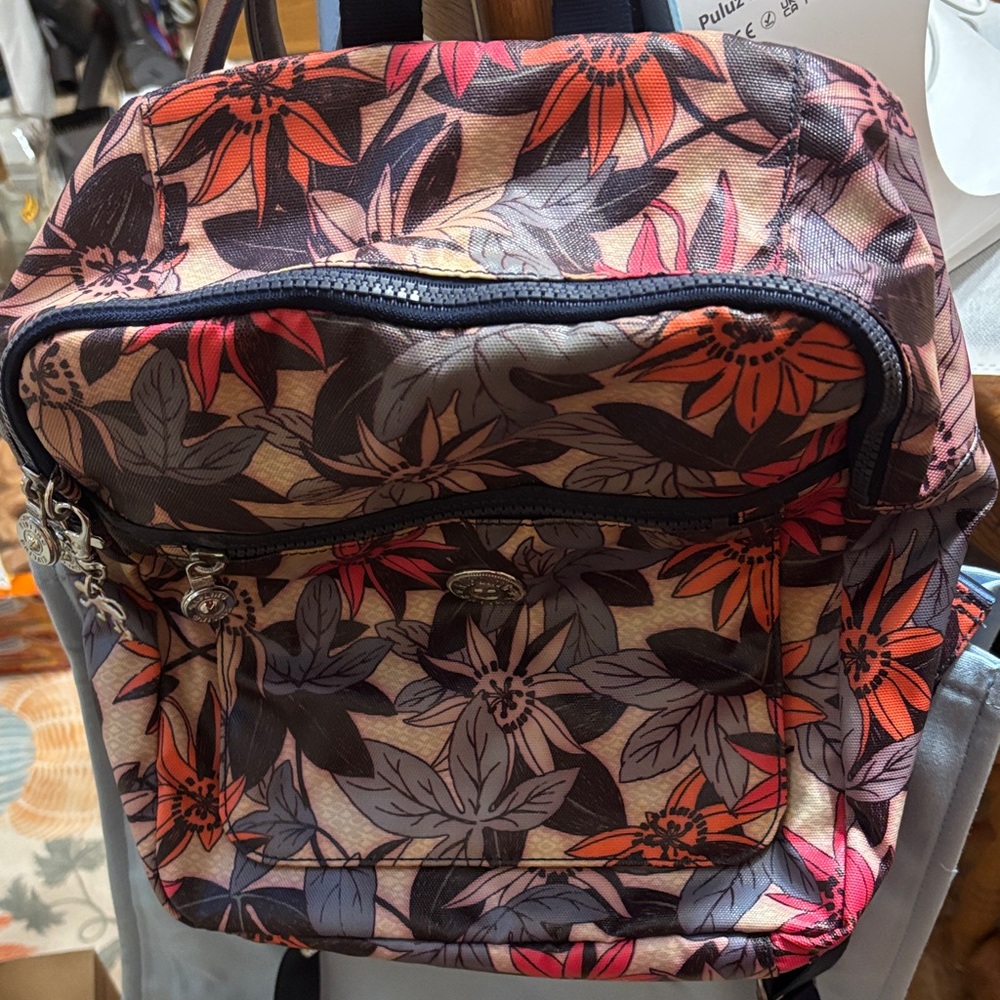 Kipling Floral Backpack with Red and Purple Accents